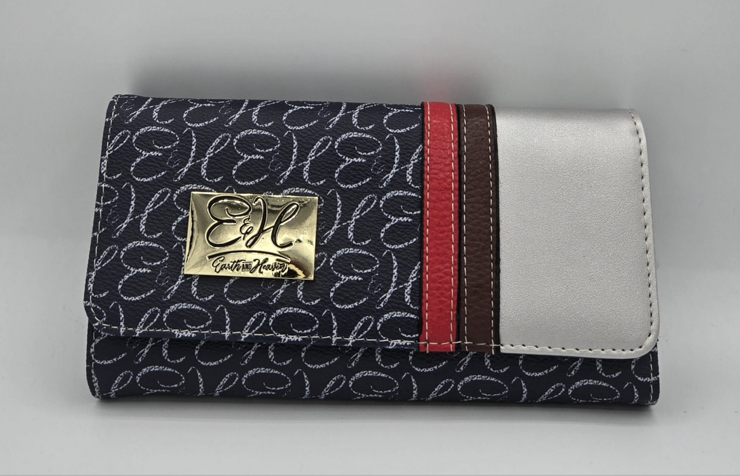 Navy blue wallet with red, brown and silver stripes